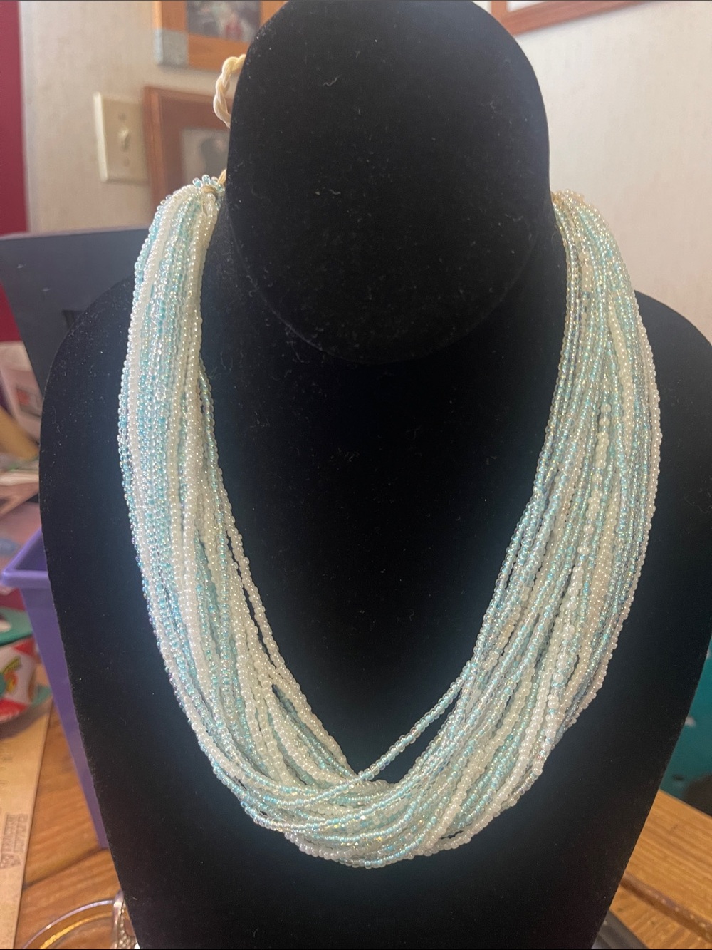 Multi-Strand Light Blue and White Seed Bead Necklace ties closed